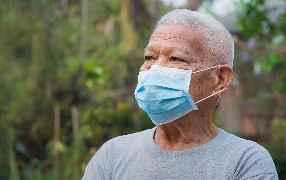 lake county header man with n95 mask